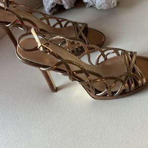 (BAKERS) Ladies fancy High heel shoes, in shiny gold color size 7.5
